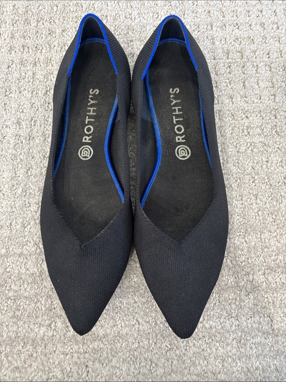 Rothy's Black Pointed Flats with Blue Trim